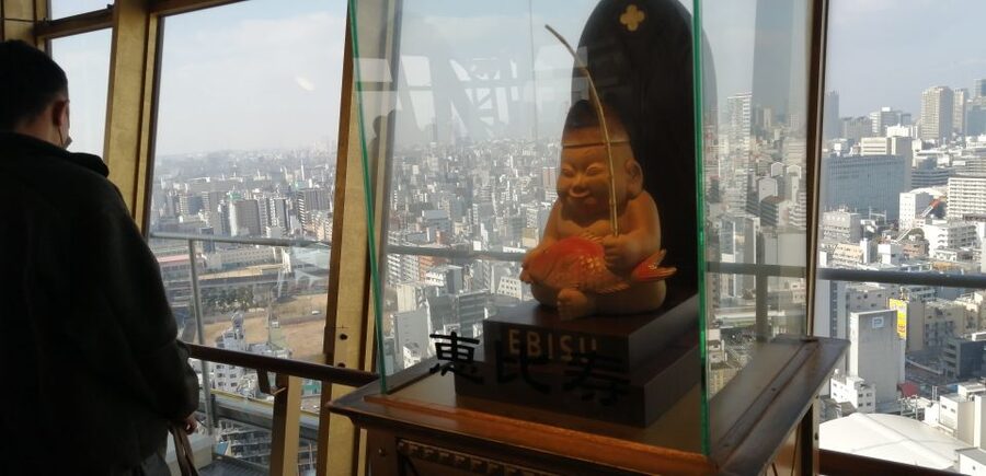 Osaka: Five Must-See Highlights Walking Tour & Ramen Lunch - Stop 3: Shinsekai and Tsutenkaku Photos With Street Food Energy